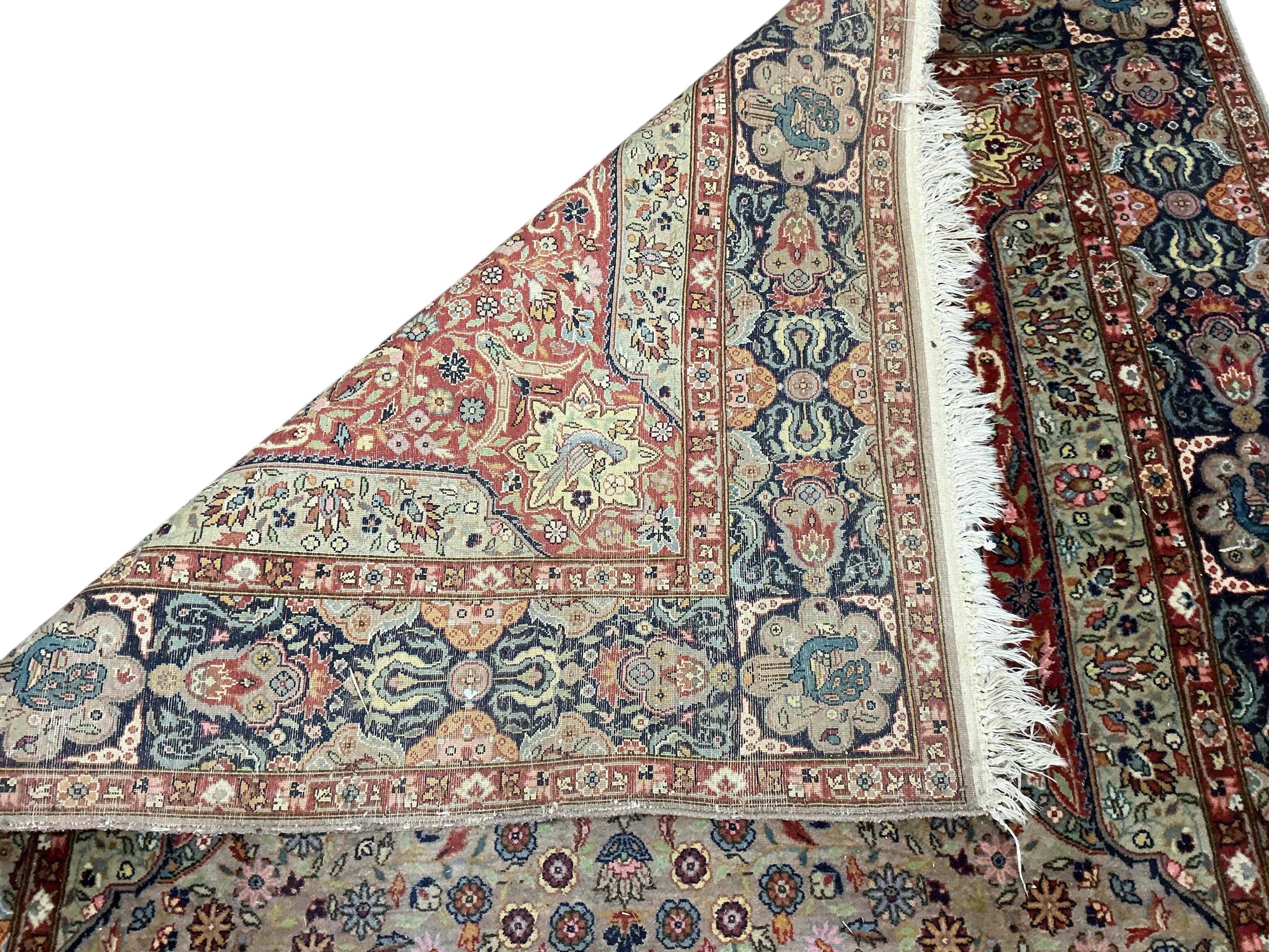 A Kerman prayer rug, the floral field with a Mihrab, 230 x 139cm